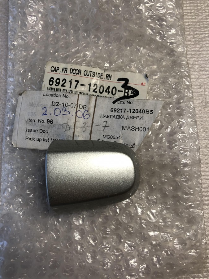 Накладка ручки двери личинки замка TOYOTA Corolla 120, AURIS, BLADE, PRIUS 6921712040B5